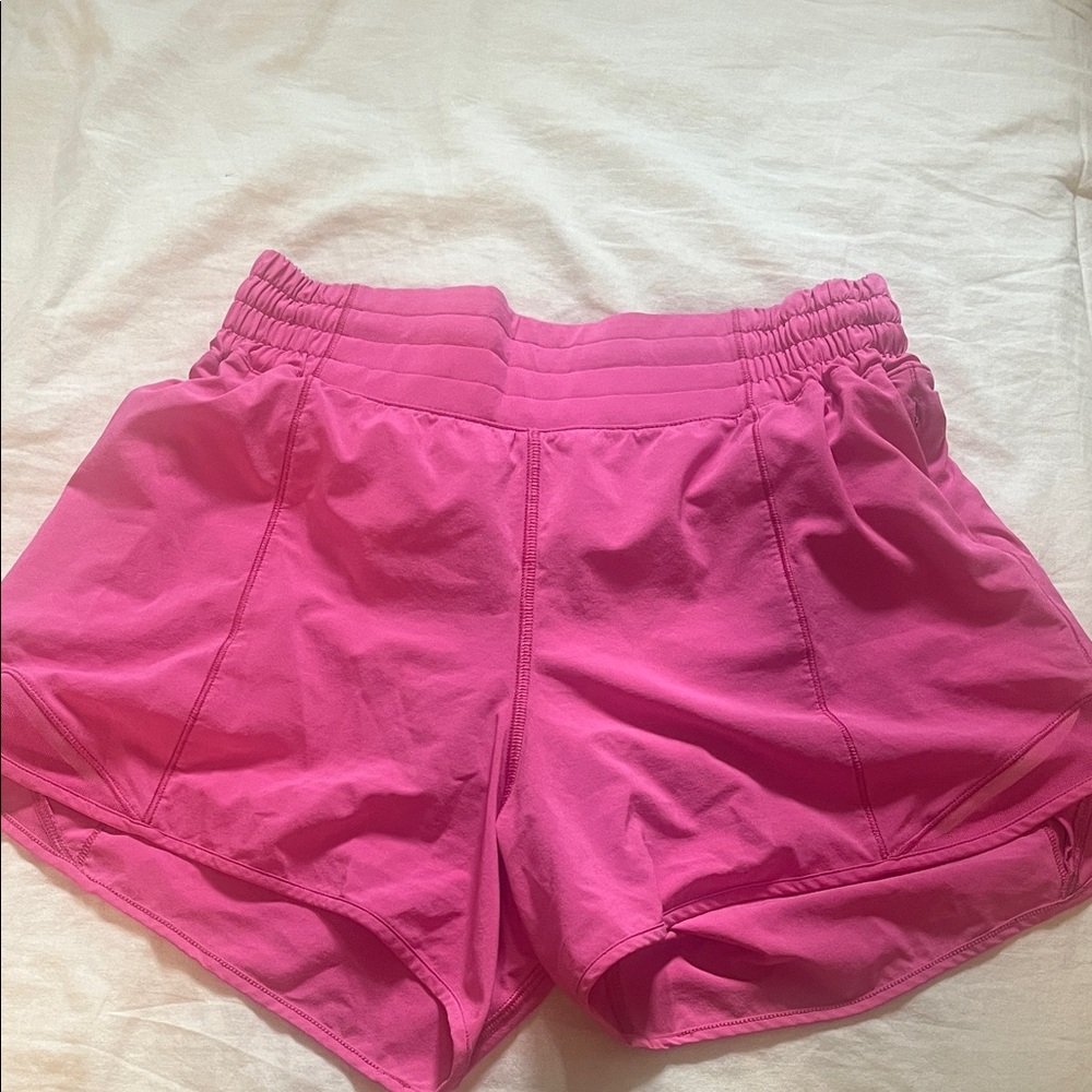 Lululemon Athletica Sonic Pink Hotty Hot Shorts 
Size 6 
4 Inch 
High rise